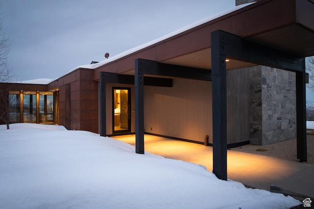 9774 N Red Hawk Trl, Park City, UT 84098 - snow covered back of property featuring stone siding