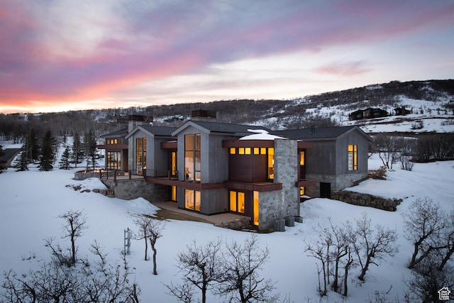 9774 N Red Hawk Trl, Park City, UT 84098 - exterior space featuring stone siding and a chimney