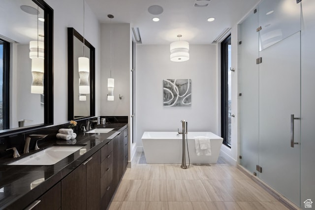 9774 N Red Hawk Trl, Park City, UT 84098 - full bathroom with a sink, a freestanding bath, double vanity, and a shower stall