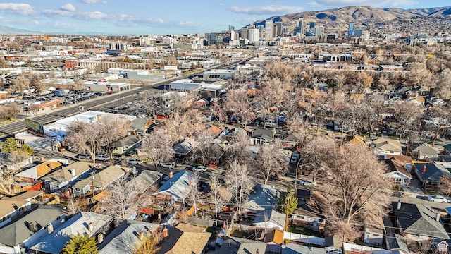 aerial view featuring a view of city and a mountain view