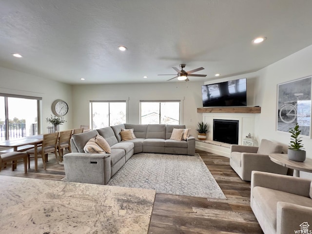 833 W Sunrise Cir, Garden City, UT 84028 - living room with dark wood-style flooring, ceiling fan, recessed lighting, and a healthy amount of sunlight