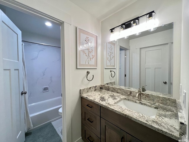 833 W Sunrise Cir, Garden City, UT 84028 - bathroom with toilet, tile patterned flooring, vanity, and bathing tub / shower combination