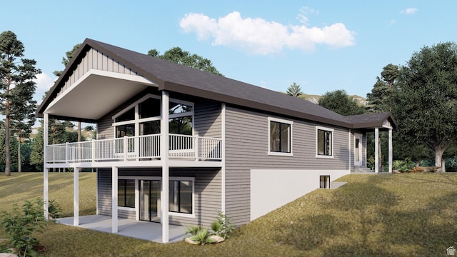 833 W Sunrise Cir, Garden City, UT 84028 - back of house with a patio, a lawn, and board and batten siding