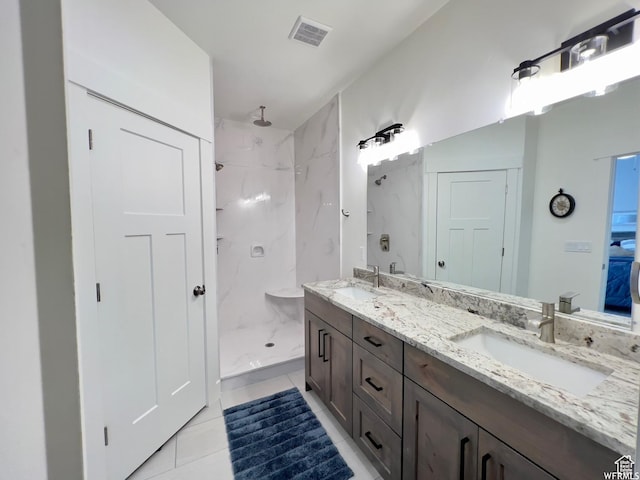 833 W Sunrise Cir, Garden City, UT 84028 - full bathroom with a sink, a marble finish shower, and visible vents