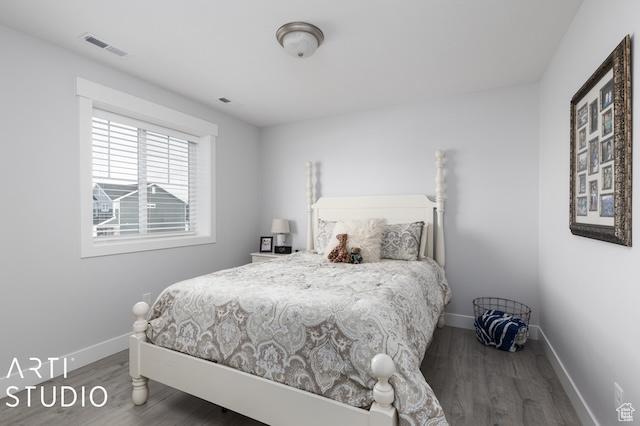 2211 W Parkview Dr, Syracuse, UT 84075 - bedroom with visible vents, wood finished floors, and baseboards