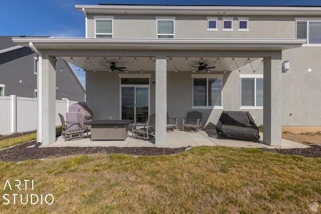 2211 W Parkview Dr, Syracuse, UT 84075 - rear view of house featuring stucco siding, a patio, and fence