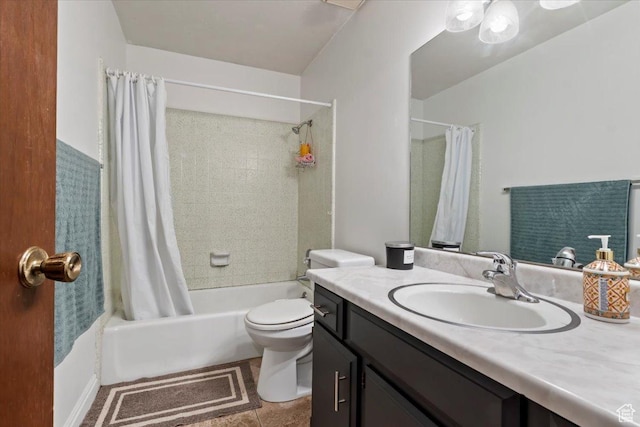 bathroom with tile patterned flooring, toilet, vanity, and shower / bath combo