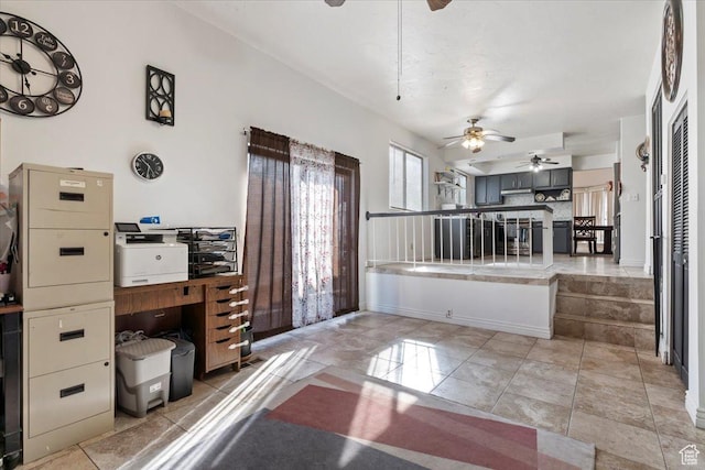 interior space featuring a ceiling fan