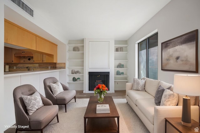 123 E 2nd Ave N Unit T-9, Salt Lake City, UT 84103 - living area featuring light wood-style floors and visible vents