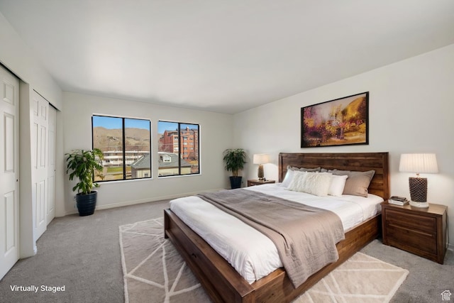 123 E 2nd Ave N Unit T-9, Salt Lake City, UT 84103 - bedroom featuring baseboards and light carpet