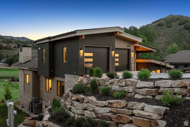 3599 Daybreaker Dr, Park City, UT 84098 - contemporary house with a mountain view and a chimney