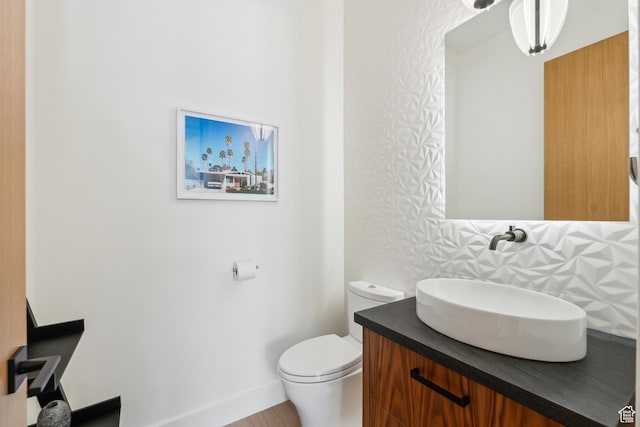 3599 Daybreaker Dr, Park City, UT 84098 - half bathroom featuring baseboards, toilet, and vanity