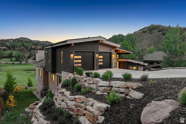 3599 Daybreaker Dr, Park City, UT 84098 - view of front of property featuring a mountain view, a garage, and driveway