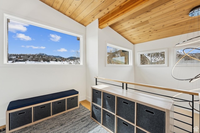 3599 Daybreaker Dr, Park City, UT 84098 - living area featuring wooden ceiling, lofted ceiling with beams, an inviting chandelier, and wood finished floors