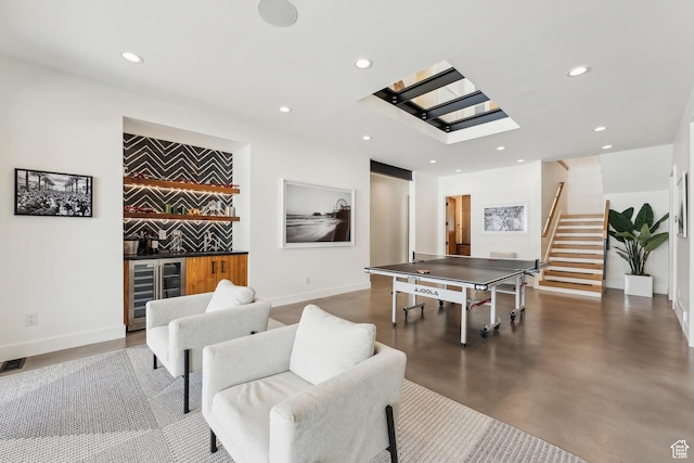3599 Daybreaker Dr, Park City, UT 84098 - recreation room with wine cooler, a bar, concrete floors, baseboards, and recessed lighting