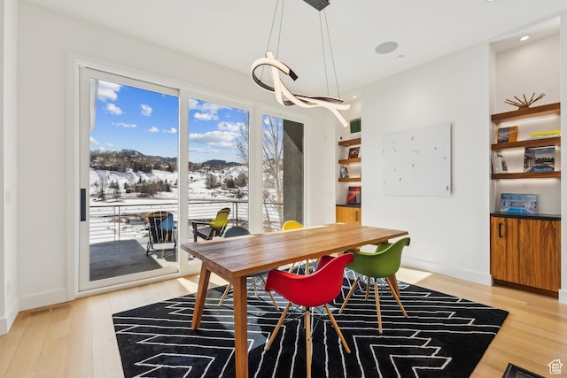 3599 Daybreaker Dr, Park City, UT 84098 - dining space featuring light wood finished floors, baseboards, visible vents, and recessed lighting