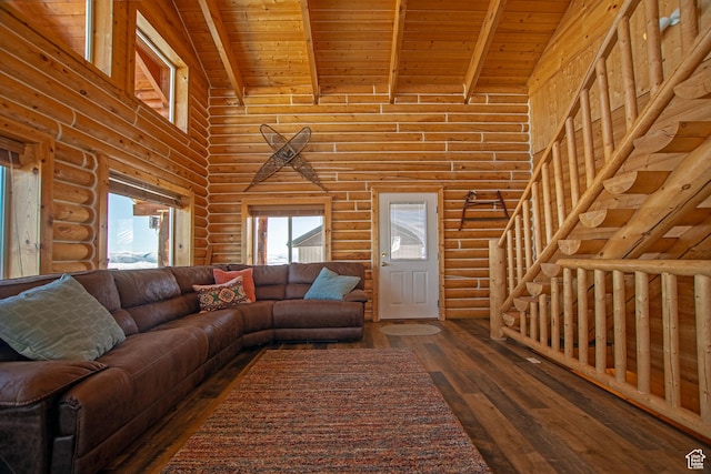 3186 S Sweetwater Pkwy, Garden City, UT 84028 - living area featuring high vaulted ceiling, rustic walls, dark wood finished floors, wood ceiling with exposed beams, and plenty of natural light