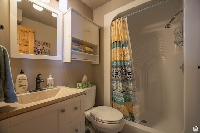 3186 S Sweetwater Pkwy, Garden City, UT 84028 - bathroom featuring a shower stall, toilet, and vanity