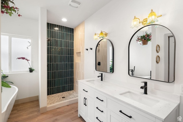 191 N Ash Creek Dr, Toquerville, UT 84774 - full bathroom featuring visible vents, a freestanding bath, wood finished floors, and a sink