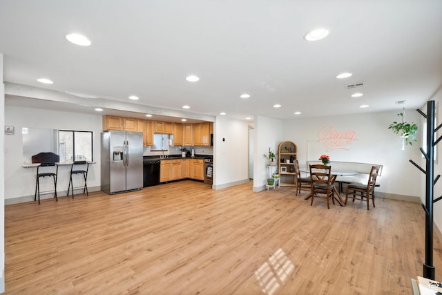 191 N Ash Creek Dr, Toquerville, UT 84774 - kitchen featuring dark countertops, light wood finished floors, baseboards, recessed lighting, and stainless steel appliances