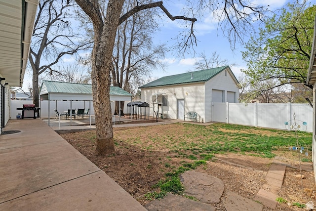 191 N Ash Creek Dr, Toquerville, UT 84774 - view of yard featuring a garage, fence, an outbuilding, and a patio area