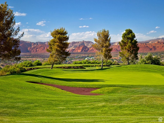 409 N Country Ln Unit 3, St George, UT 84770 - surrounding community featuring a lawn, a mountain view, and view of golf course