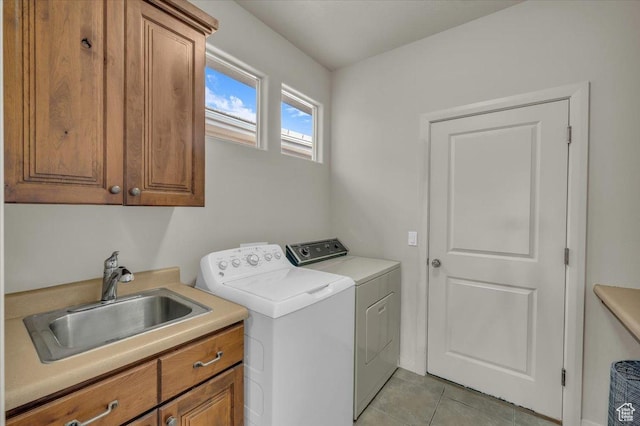 409 N Country Ln Unit 3, St George, UT 84770 - laundry area with a sink, cabinet space, light tile patterned floors, and washer and clothes dryer