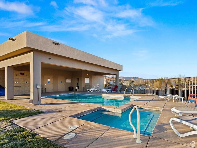 409 N Country Ln Unit 3, St George, UT 84770 - pool featuring a patio area, a hot tub, and fence