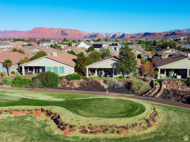 birds eye view of property with a residential view and a mountain view