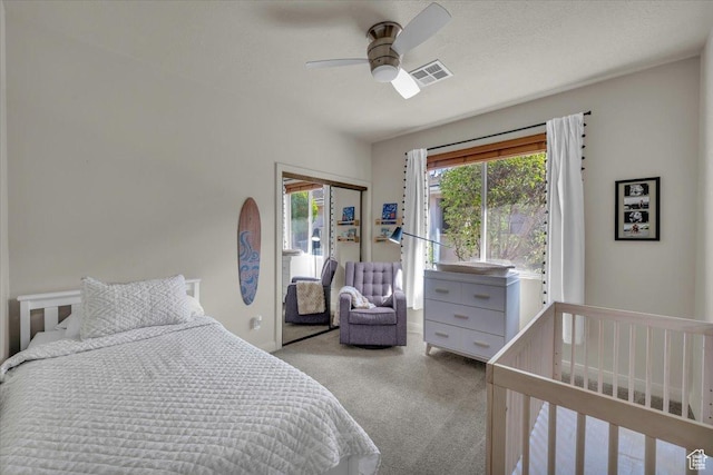 409 N Country Ln Unit 3, St George, UT 84770 - bedroom with visible vents, a ceiling fan, a closet, and carpet floors