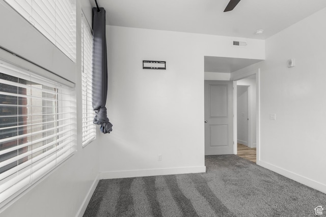 875 S Depot St Unit 344B, Clearfield, UT 84015 - unfurnished room with visible vents, baseboards, carpet, and a ceiling fan