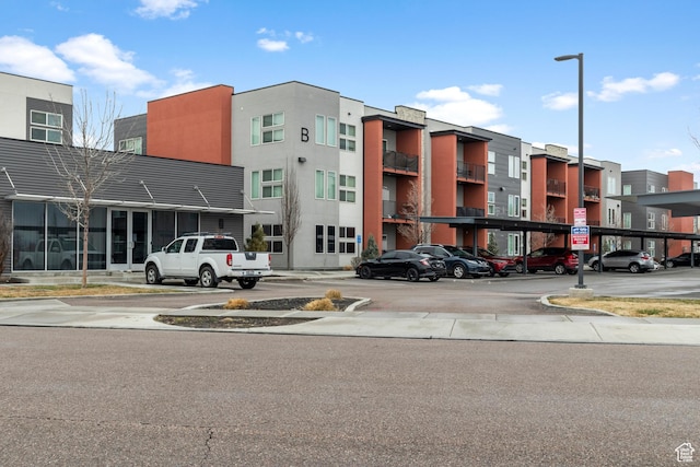 875 S Depot St Unit 344B, Clearfield, UT 84015 - view of property with covered and uncovered parking