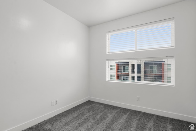875 S Depot St Unit 344B, Clearfield, UT 84015 - spare room with baseboards and dark colored carpet