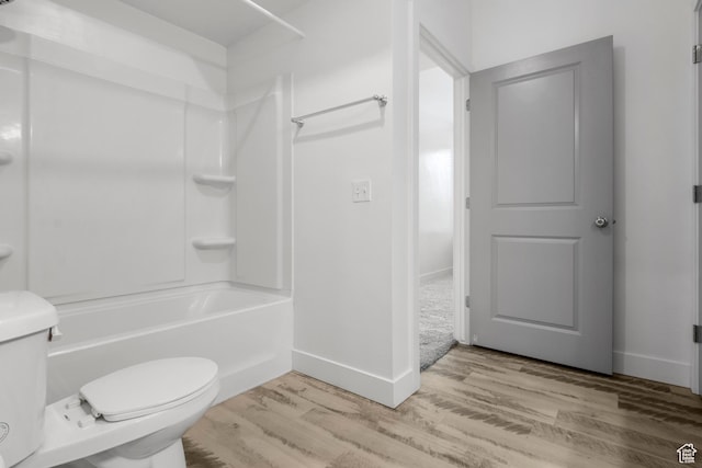 875 S Depot St Unit 344B, Clearfield, UT 84015 - bathroom featuring baseboards, toilet, wood finished floors, and bathtub / shower combination