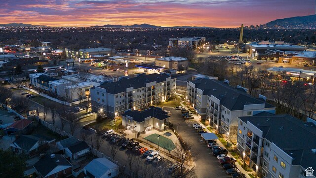 1134 E 3300 S Unit 216, Millcreek, UT 84106 - aerial view at dusk featuring a mountain view