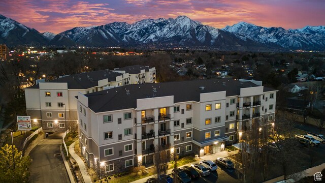 1134 E 3300 S Unit 216, Millcreek, UT 84106 - aerial view at dusk featuring a mountain view