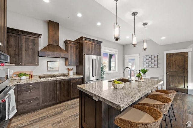 1733 E Viewside Cir, Hideout, UT 84036 - kitchen with stainless steel appliances, premium range hood, a sink, recessed lighting, and dark wood-type flooring