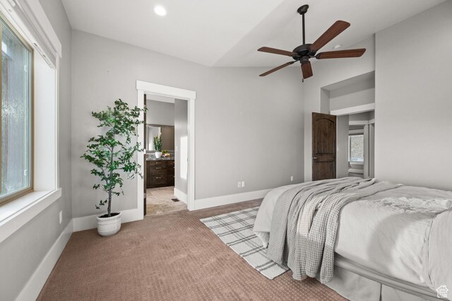 1733 E Viewside Cir, Hideout, UT 84036 - bedroom with carpet floors, vaulted ceiling, baseboards, a ceiling fan, and ensuite bath