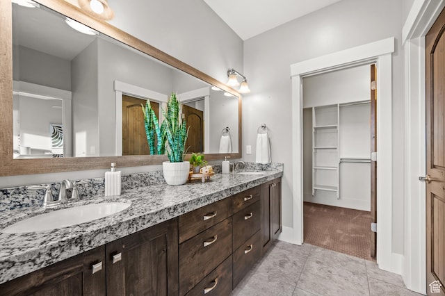 1733 E Viewside Cir, Hideout, UT 84036 - bathroom featuring tile patterned floors, double vanity, and a spacious closet