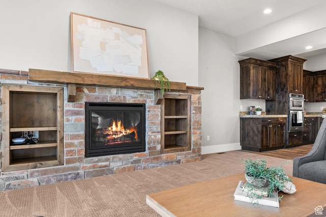 1733 E Viewside Cir, Hideout, UT 84036 - living area featuring a glass covered fireplace, carpet, baseboards, and recessed lighting