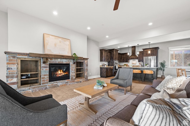 1733 E Viewside Cir, Hideout, UT 84036 - living area featuring a glass covered fireplace, baseboards, recessed lighting, and a ceiling fan