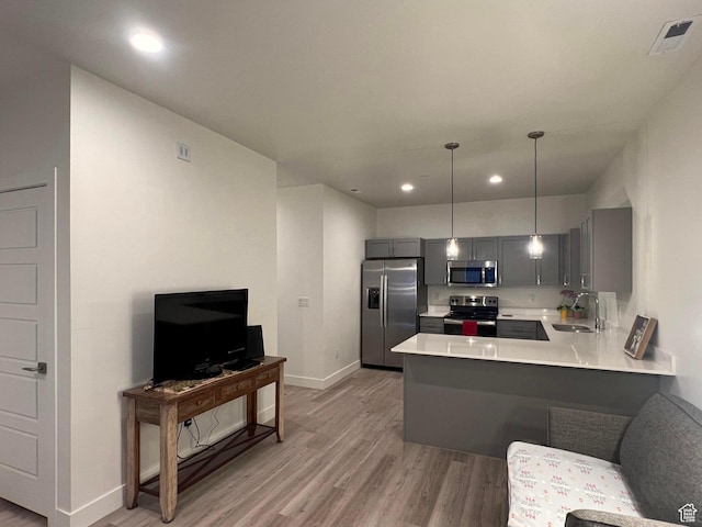 3578 S 805 E Unit 237, Millcreek, UT 84106 - kitchen featuring visible vents, a sink, light countertops, appliances with stainless steel finishes, and gray cabinetry