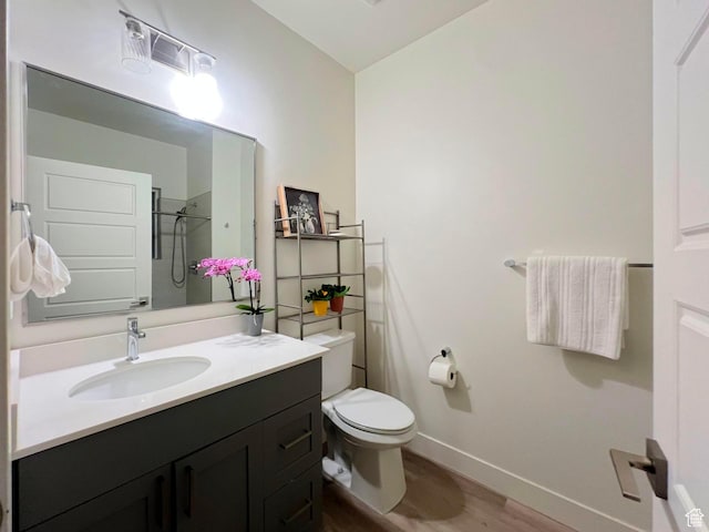 3578 S 805 E Unit 237, Millcreek, UT 84106 - full bathroom with vanity, baseboards, toilet, a shower, and wood finished floors