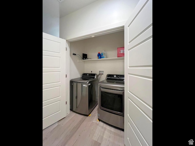 3578 S 805 E Unit 237, Millcreek, UT 84106 - clothes washing area with washing machine and clothes dryer, light wood-type flooring, and laundry area