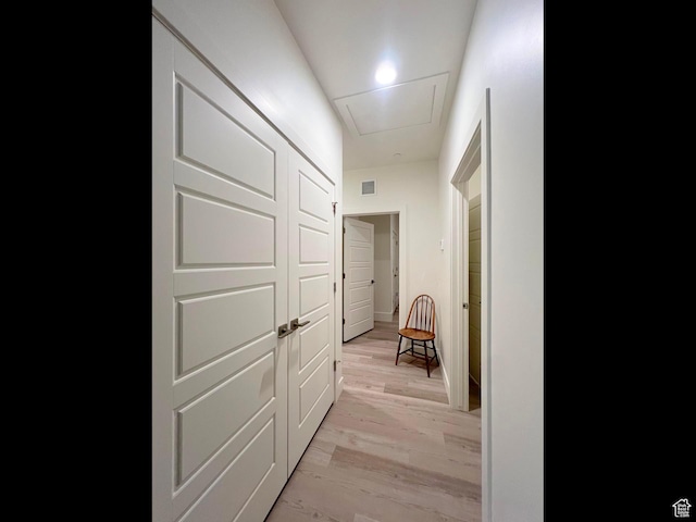 3578 S 805 E Unit 237, Millcreek, UT 84106 - corridor featuring visible vents, light wood-style flooring, and attic access