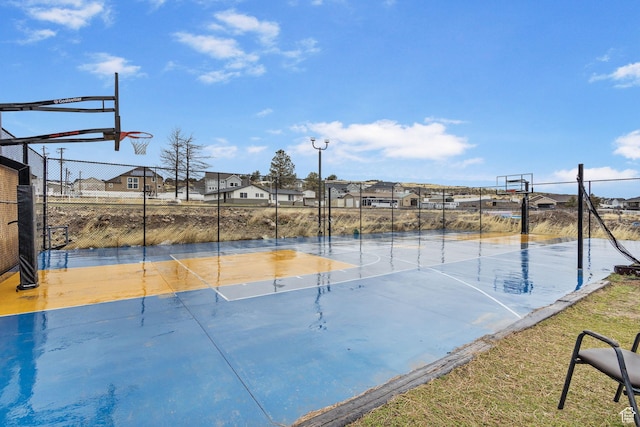 6948 W Dusty Rose Cir, Herriman, UT 84065 - view of sport court featuring a residential view, community basketball court, and fence