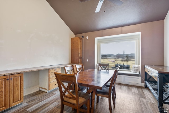 6948 W Dusty Rose Cir, Herriman, UT 84065 - dining room featuring vaulted ceiling, baseboards, ceiling fan, and wood finished floors