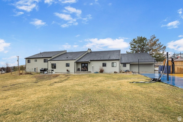 6948 W Dusty Rose Cir, Herriman, UT 84065 - back of property with a lawn and fence