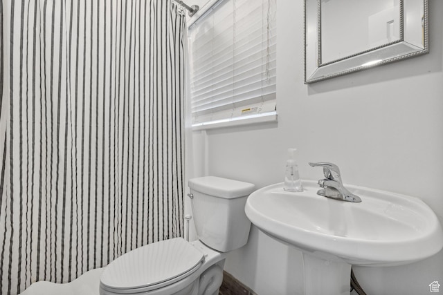 6948 W Dusty Rose Cir, Herriman, UT 84065 - bathroom with a shower with curtain, toilet, and a sink