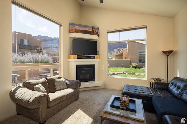 3686 S Spanish Valley Dr Unit U-3, Moab, UT 84532 - living area with carpet, a healthy amount of sunlight, and vaulted ceiling